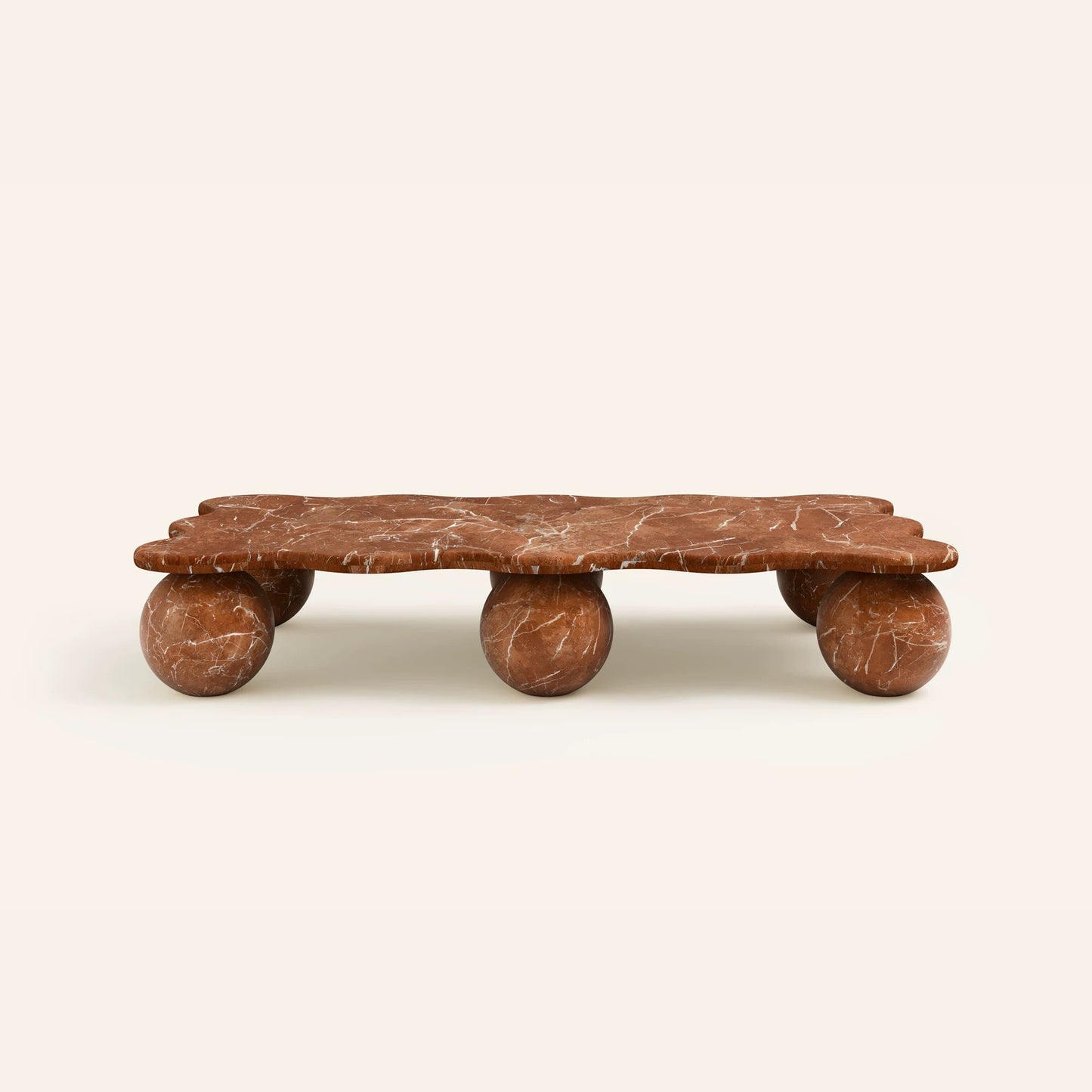 Sculptural rectangular marble coffee table with spherical stone legs