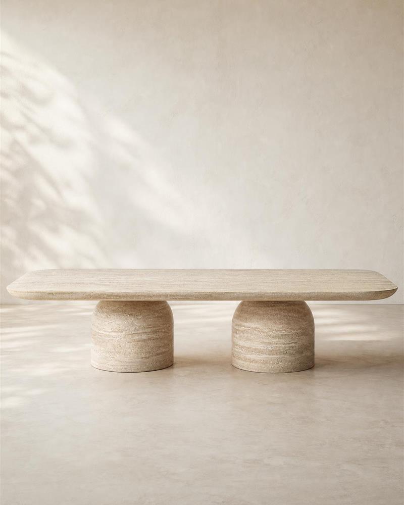 Beige travertine rectangular coffee table with two rounded pedestal bases