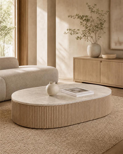 Taj Mahal oval coffee table in a neutral living room with wooden furniture