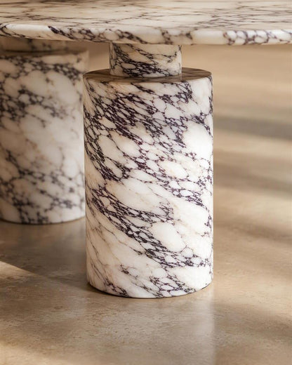 Close-up of Turkish Calacatta Viola marble stepped pedestal