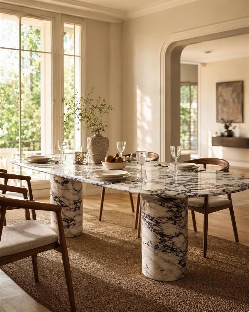 Turkish Calacatta Viola dining table styled in a sunlit dining room