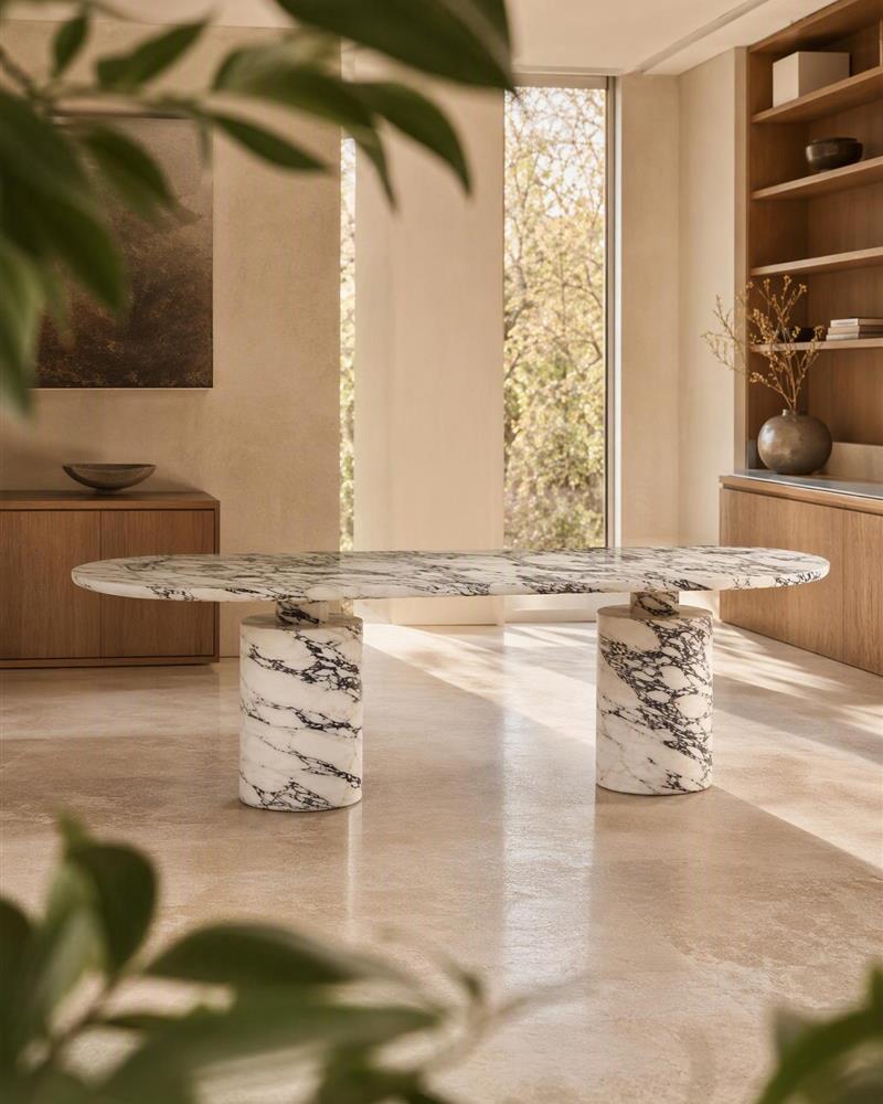 Turkish Calacatta Viola oval dining table in a minimalist interior